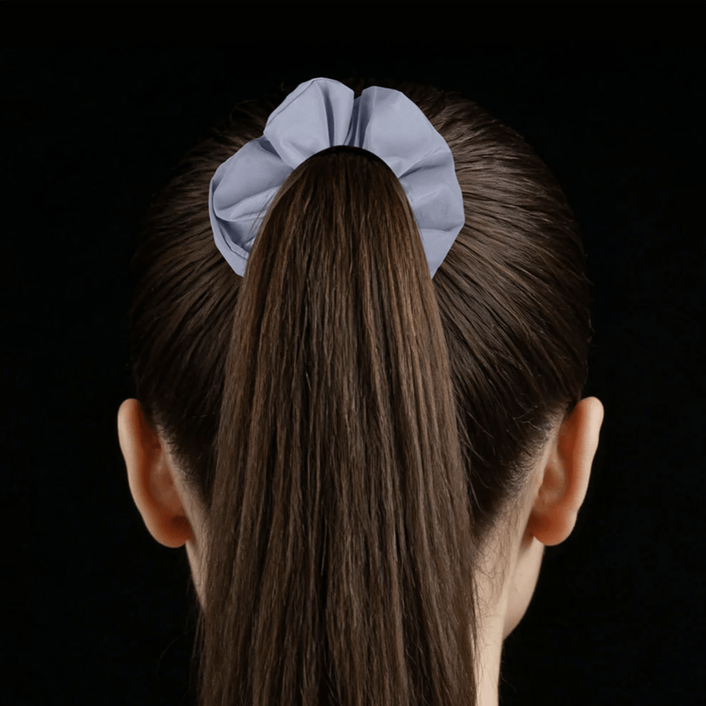 Silver Reflective Hair Srunchie on a poneytail daytime back view by Proviz